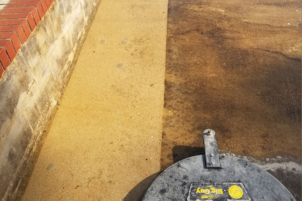 concrete cleaning before and after with pressure washer