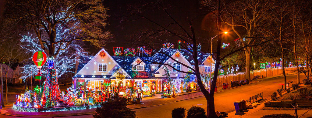 holiday light installation on home and along street